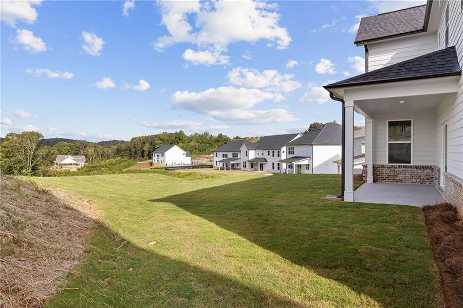 Exterior details and patio area of a home in The Estates at Gainesville Township, Gainesville (Image 12).