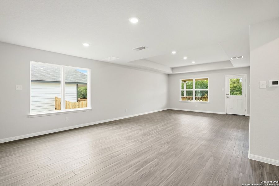Spacious, unfurnished interior of a new home in Hunters Ranch, San Antonio (Image 15).