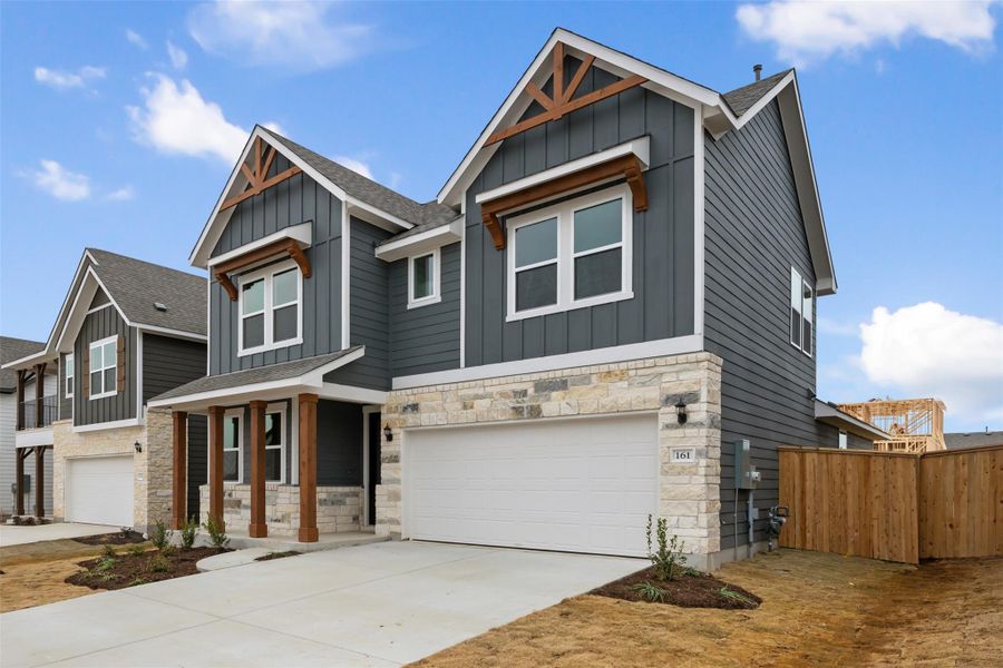 Front exterior of a new home in Patterson Ranch, Georgetown, TX, highlighting curb appeal (Image 20).