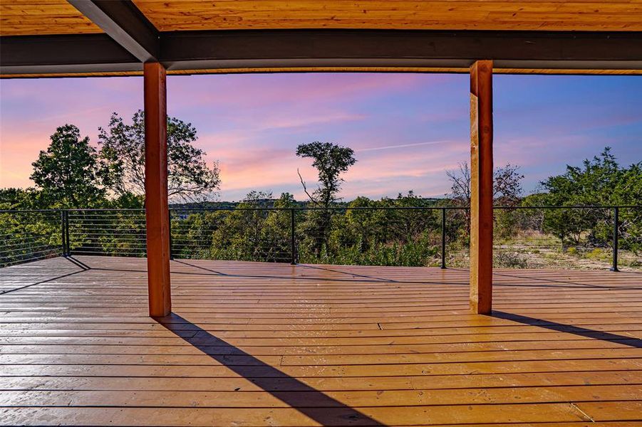 View of deck at dusk View of deck at dusk