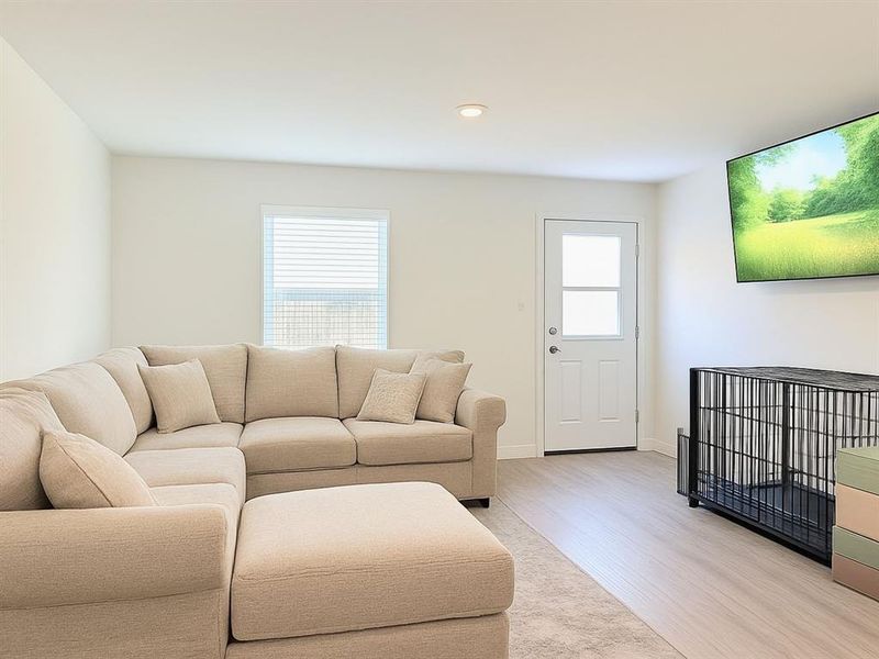 Family Room with backdoor to fenced in backyard Family Room with backdoor to fenced in backyard