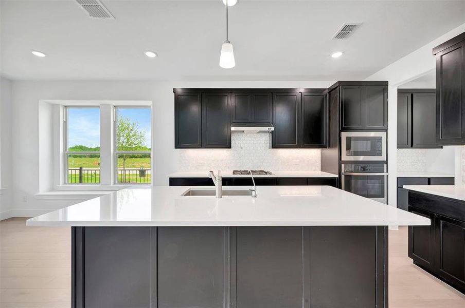 Furnished interior view inside a new home in Lily Creek at Sutton Fields, Aubrey (Image 5). Furnished interior view inside a new home in Lily Creek at Sutton Fields, Aubrey (Image 5).