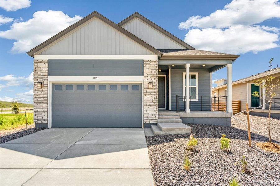 Front exterior of a new home in Legato, Commerce City, CO, highlighting curb appeal (Image 19).