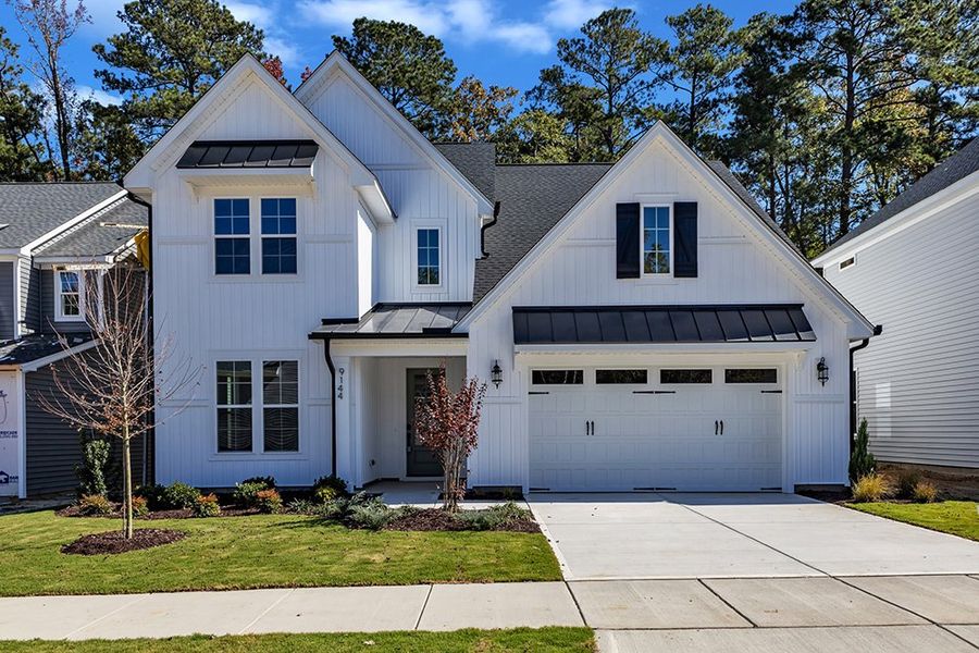 Representative exterior photo of a completed home built from the The Whitley by RobuckHomes in Windwater, Hampstead, NC (Image 28).