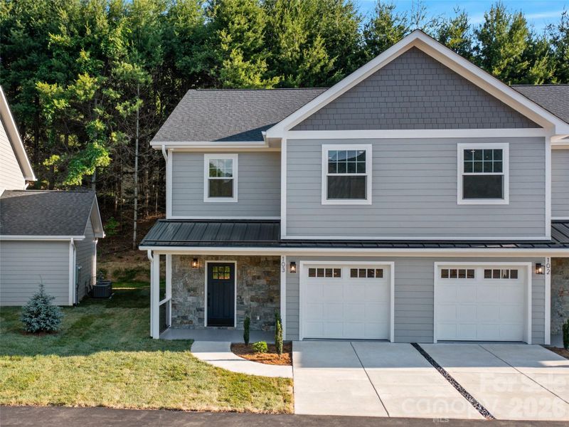 Front exterior of a new home in , Burnsville, NC, highlighting curb appeal (Image 22).