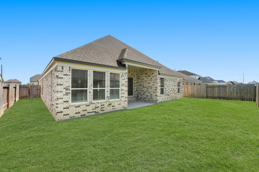 Front exterior of a new home in Briarwood Crossing, Rosenberg, TX, highlighting curb appeal (Image 17). Front exterior of a new home in Briarwood Crossing, Rosenberg, TX, highlighting curb appeal (Image 17).