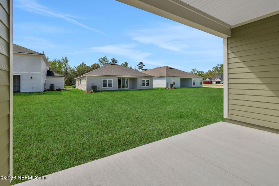 Exterior details and patio area of a home in Jennings Farm, Middleburg (Image 25).