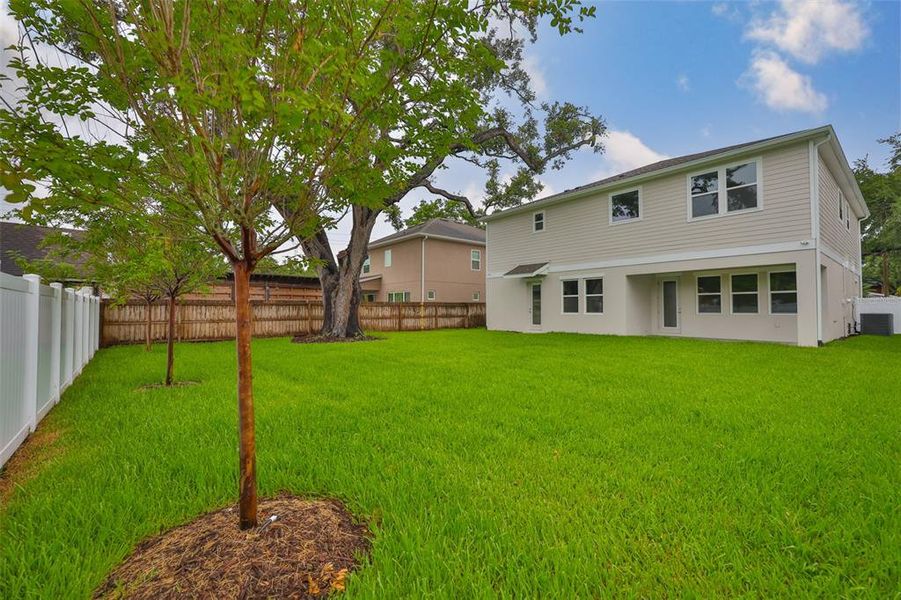 Front exterior of a new home in , Tampa, FL, highlighting curb appeal (Image 25).