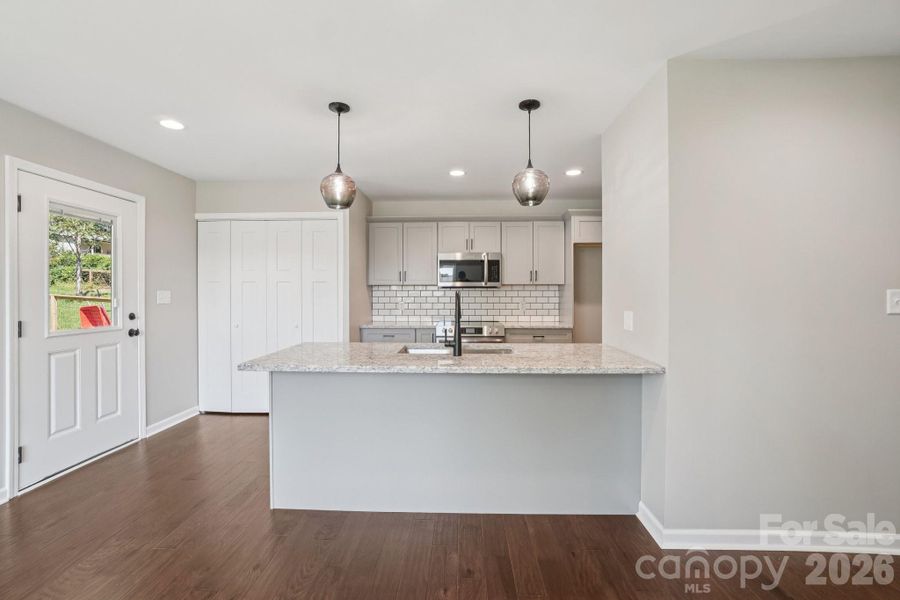 Modern kitchen with seperate entry from covered parking