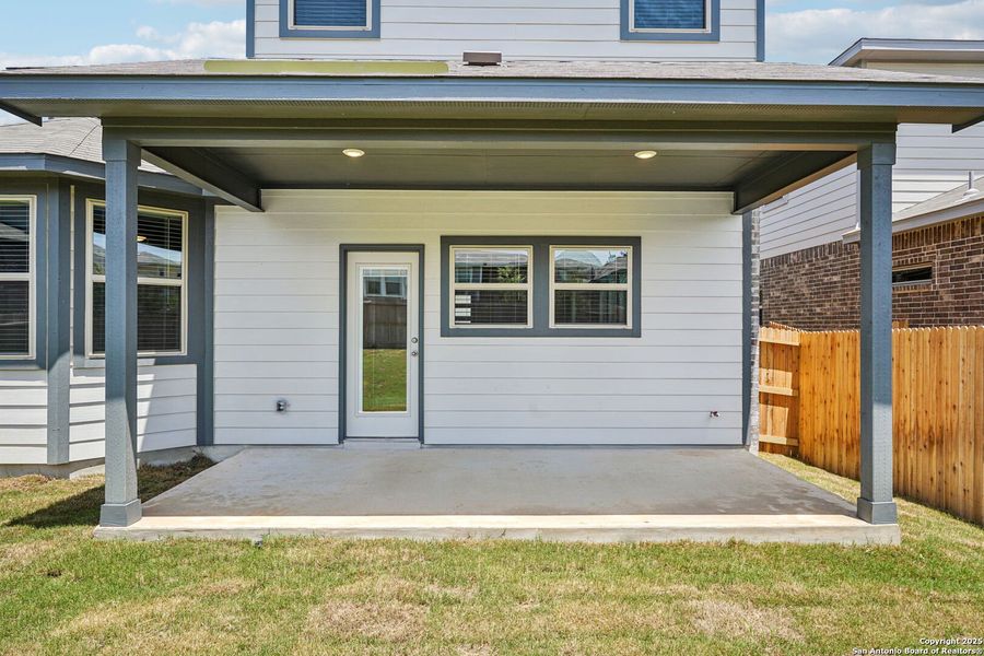 Front exterior of a new home in Comanche Ridge, San Antonio, TX, highlighting curb appeal (Image 24). Front exterior of a new home in Comanche Ridge, San Antonio, TX, highlighting curb appeal (Image 24).