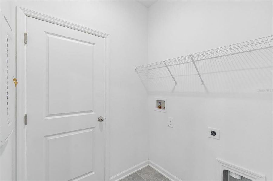Spacious, unfurnished interior of a new home in Peace Creek Reserve, Winter Haven (Image 24).