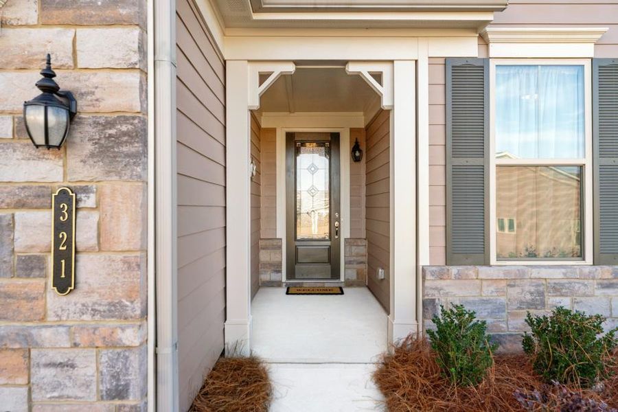 Exterior details and patio area of a home in , Hoschton (Image 28).