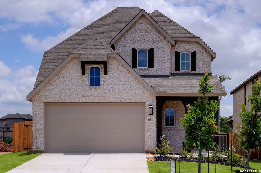 Front exterior of a new home in Davis Ranch, San Antonio, TX, highlighting curb appeal (Image 1). Front exterior of a new home in Davis Ranch, San Antonio, TX, highlighting curb appeal (Image 1).