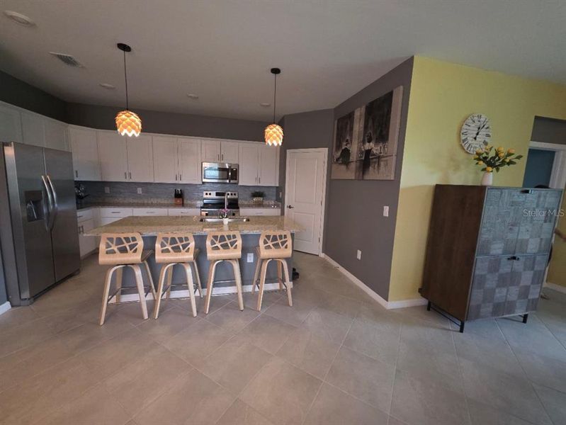 Furnished interior view inside a new home in , Port Charlotte (Image 20).