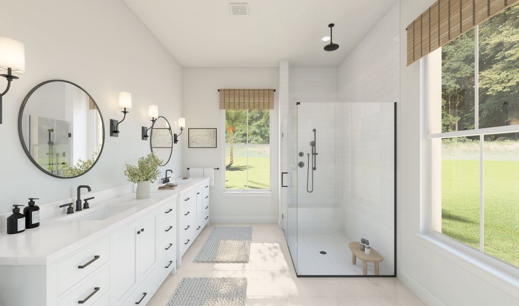 Primary bath with glass shower and dual vanities