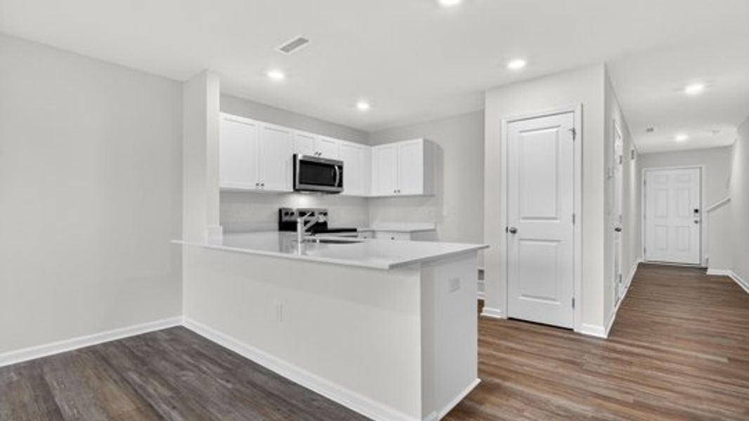 Furnished interior view inside a new home in The Townes at Belle Grove, Wendell (Image 5).