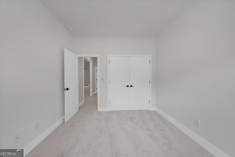 Spacious, unfurnished interior of a new home in Canterbury Villas, Carrollton (Image 27).