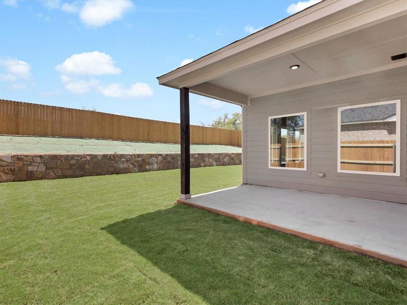 Exterior details and patio area of a home in , Springtown (Image 3).