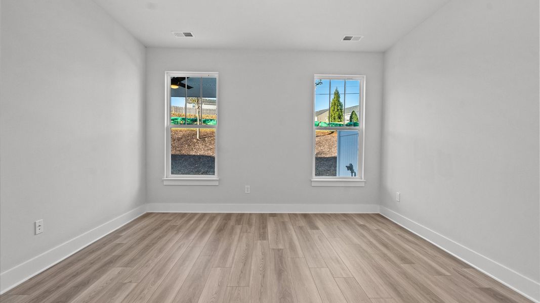 Furnished interior view inside a new home in Camden Cottages, Greenville (Image 18).