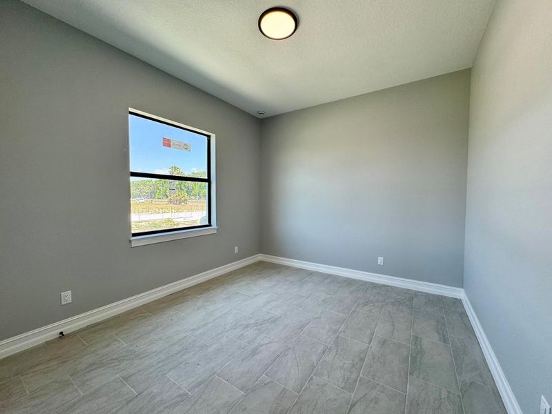 Spacious, unfurnished interior of a new home in , Okeechobee (Image 18).