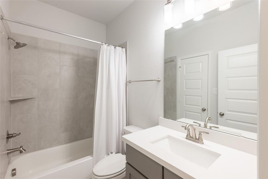 Furnished interior view inside a new home in Elyson, Katy (Image 39).