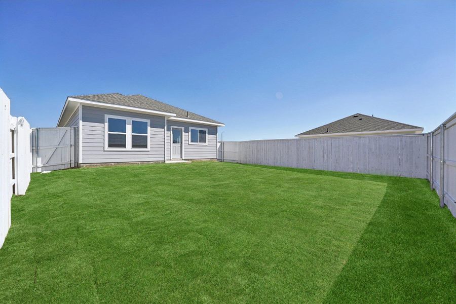 Rear of Home and Private Backyard