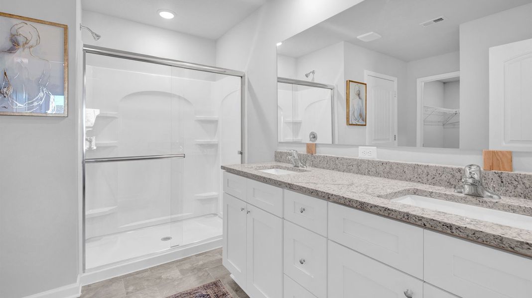 Representative furnished interior of a home built from the Cali by D.R. Horton in Riggs Pointe, Millington (Image 22).