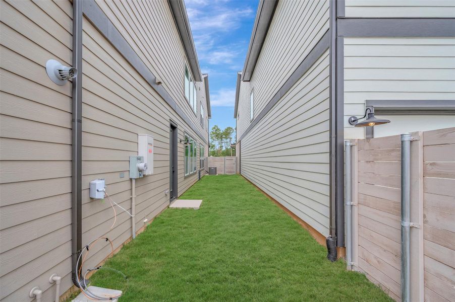 Exterior details and patio area of a home in , Montgomery (Image 4).