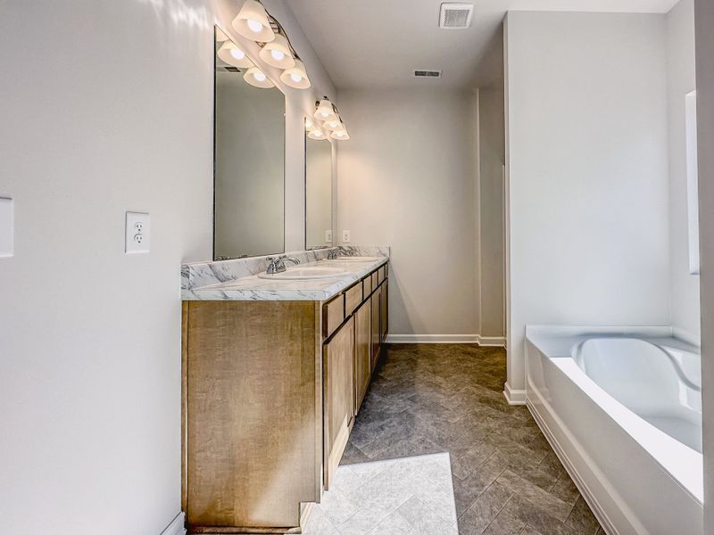 Image 30 representing the The Hampton by Smith Douglas Homes in Enclave at Willis, Willis, TX.