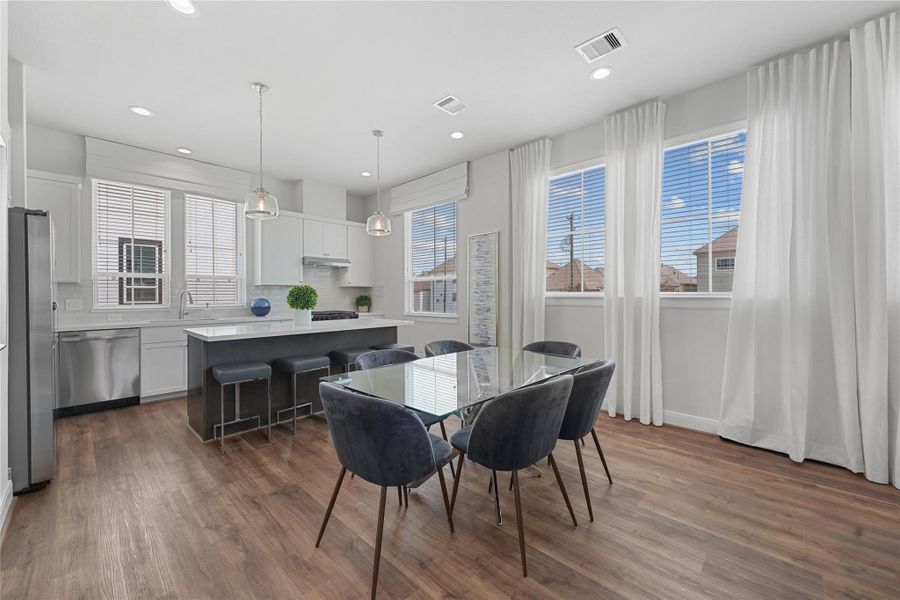 Furnished interior view inside a new home in The Corner At Buffalo Pointe, Houston (Image 14).