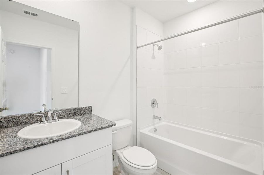 Furnished interior view inside a new home in Villamar - Classic Series, Winter Haven (Image 10).