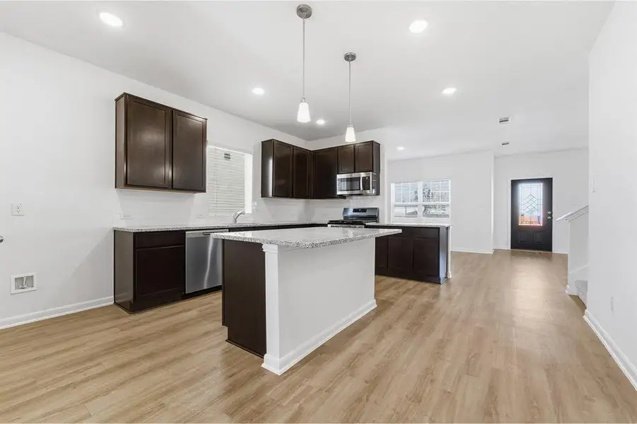 Furnished interior view inside a new home in La Terra, Celina (Image 6).