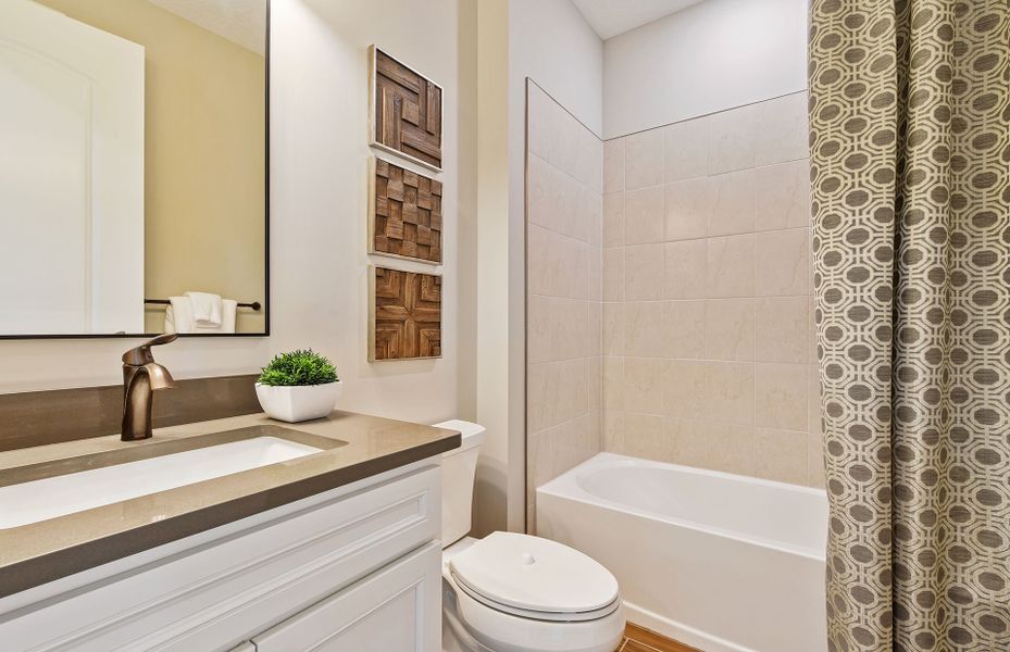 Representative furnished interior of a home built from the Palmary by DiVosta in Talon Preserve on Palmer Ranch, Nokomis (Image 15).