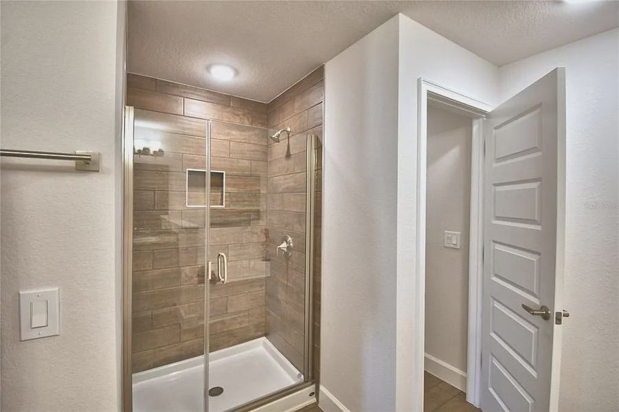 Furnished interior view inside a new home in Magnolia Park, Haines City (Image 32).