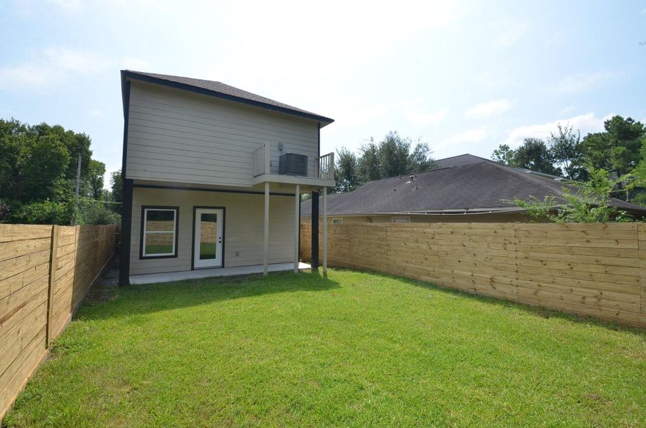 Front exterior of a new home in , Houston, TX, highlighting curb appeal (Image 27). Front exterior of a new home in , Houston, TX, highlighting curb appeal (Image 27).