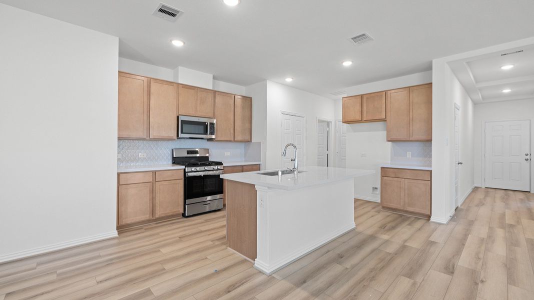 Furnished interior view inside a new home in Oakwood Estates, Waller (Image 15).