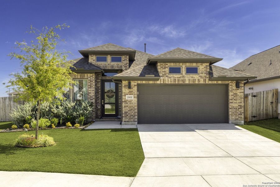 Front exterior of a new home in The Village of Mill Creek 50', Seguin, TX, highlighting curb appeal (Image 22).