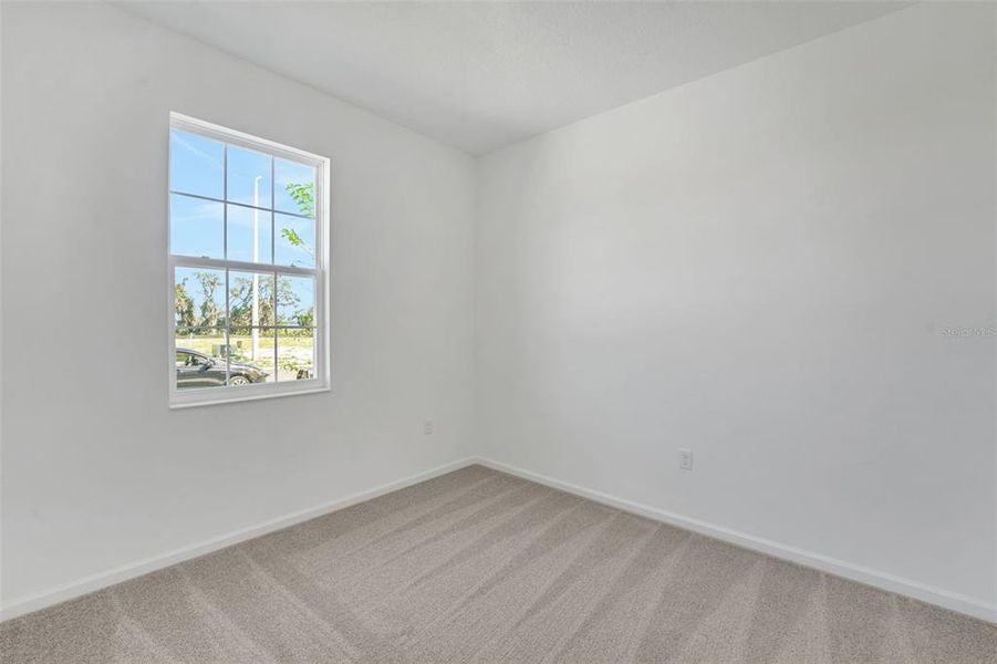 Spacious, unfurnished interior of a new home in Willowbrook North, Winter Haven (Image 27).