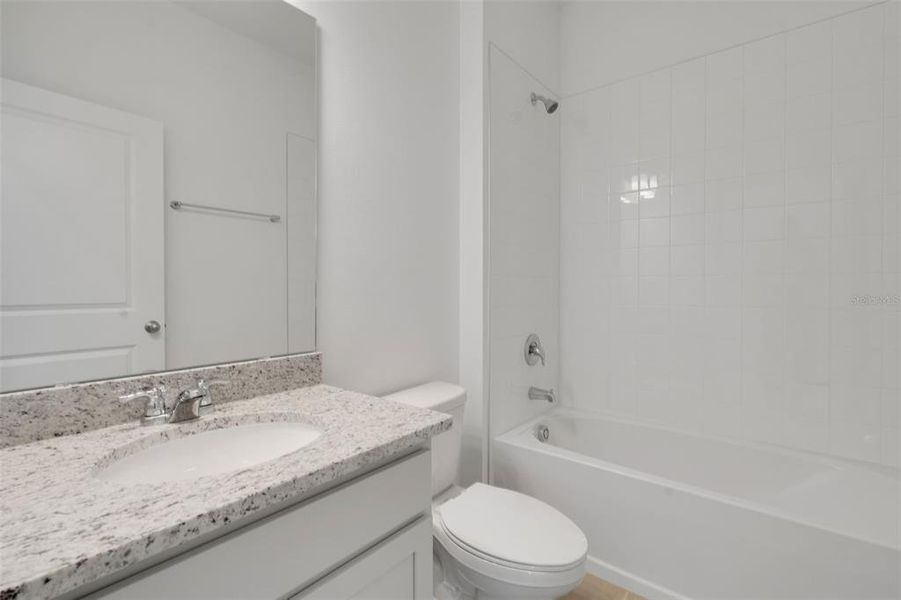 Furnished interior view inside a new home in Seaport Village, Tavares (Image 6).