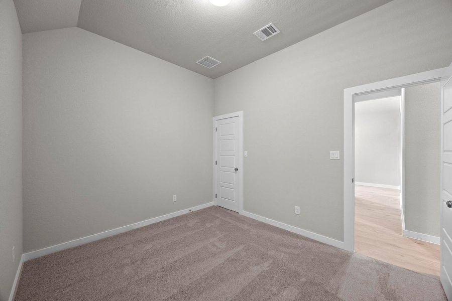 Spacious, unfurnished interior of a new home in Lakeside at Tessera, Lago Vista (Image 23). Spacious, unfurnished interior of a new home in Lakeside at Tessera, Lago Vista (Image 23).