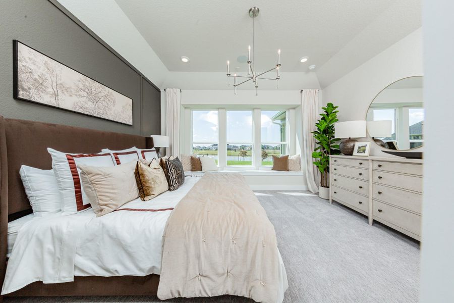 Primary bedroom. Representative model home photos shown for illustrative purposes only. Actual home, features, and finishes may vary. Home is currently under construction.