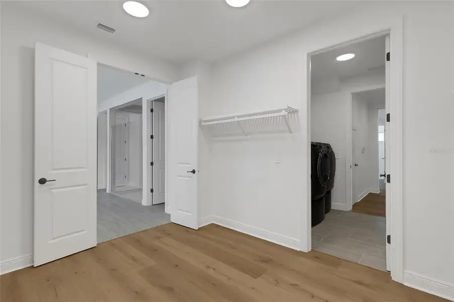 Spacious, unfurnished interior of a new home in Cassata Lakes, Nokomis (Image 57).