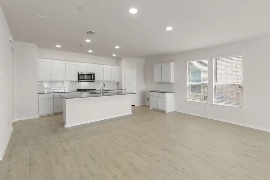 Representative exterior photo of a completed home built from the Lavon by Impression Homes in Creekshaw, Royse City, TX (Image 8). Representative exterior photo of a completed home built from the Lavon by Impression Homes in Creekshaw, Royse City, TX (Image 8).