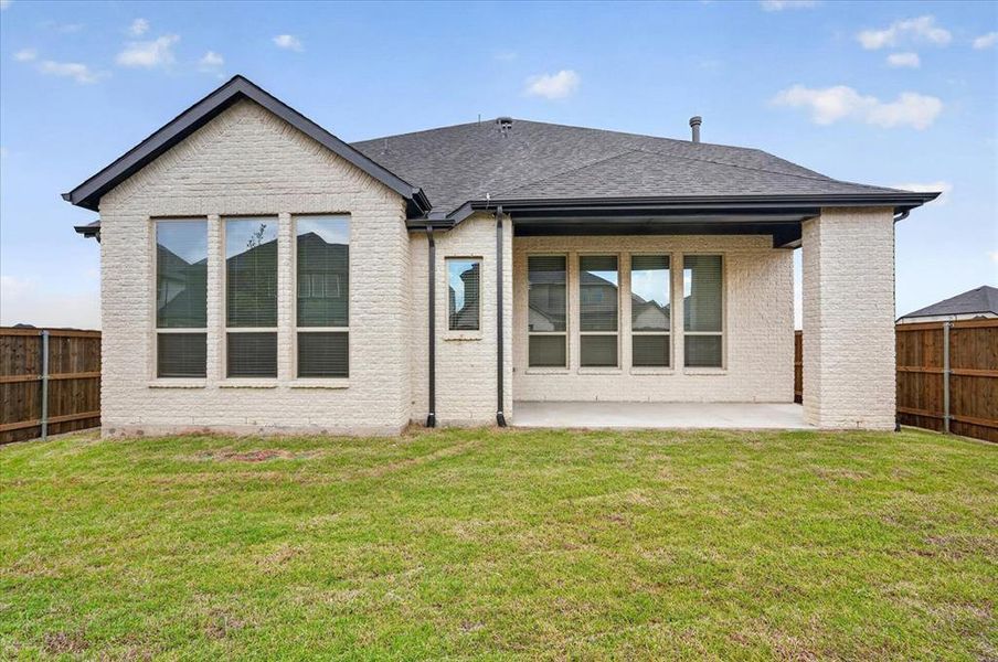 Exterior details and patio area of a home in Cambridge Crossing, Celina (Image 2).