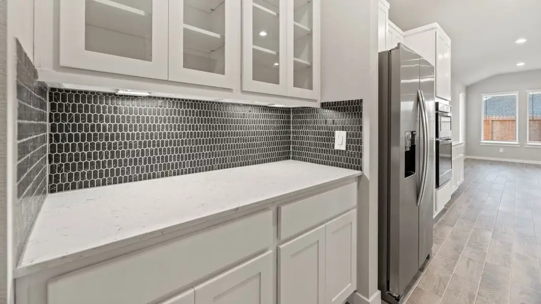 Representative furnished interior of a home built from the Colby by D.R. Horton in Westland Ranch 50' Homesites, League City (Image 7).