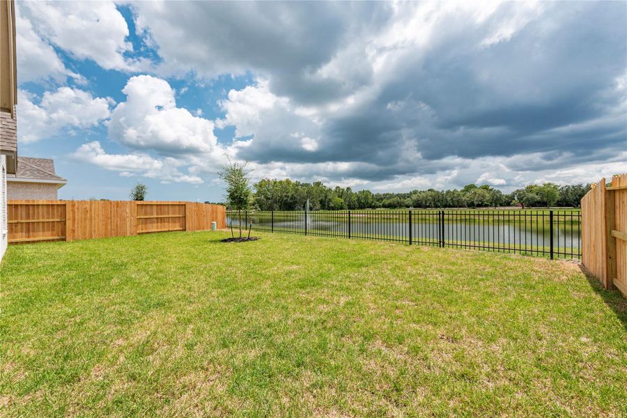 Front exterior of a new home in , Santa Fe, TX, highlighting curb appeal (Image 20). Front exterior of a new home in , Santa Fe, TX, highlighting curb appeal (Image 20).
