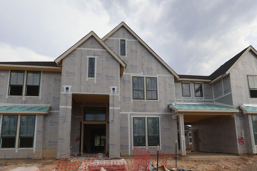 In-progress construction of a new home in Woodson’s Reserve, Spring, TX (Image 3). In-progress construction of a new home in Woodson’s Reserve, Spring, TX (Image 3).