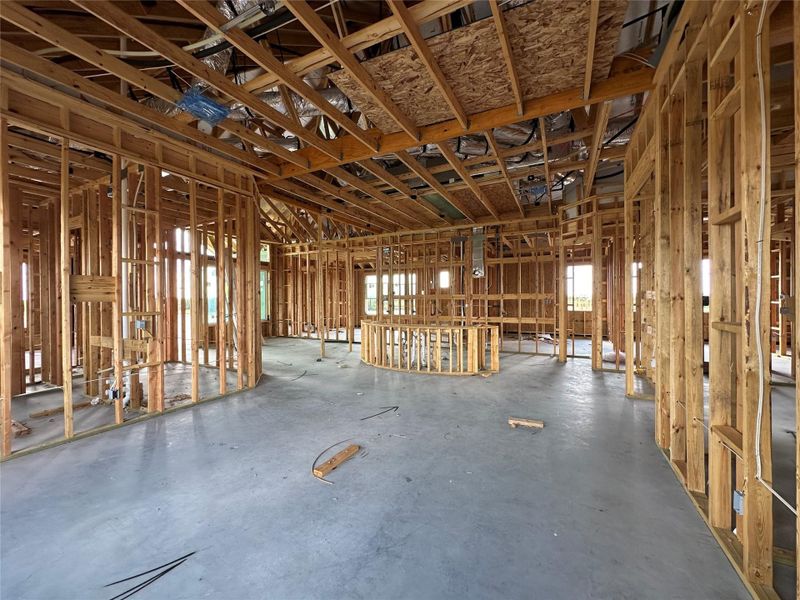Witness the meticulous craftsmanship of a home under construction, framed with robust wood.