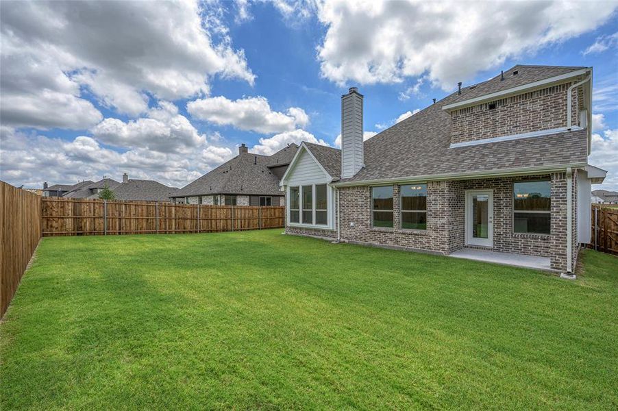 Exterior details and patio area of a home in Stone River Glen, Royse City (Image 4). Exterior details and patio area of a home in Stone River Glen, Royse City (Image 4).