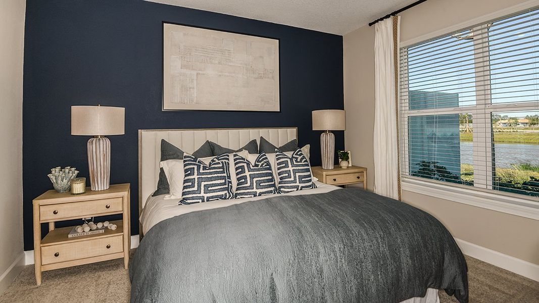 Furnished interior view inside a new home in Esplanade at Kingston, Estero (Image 19).